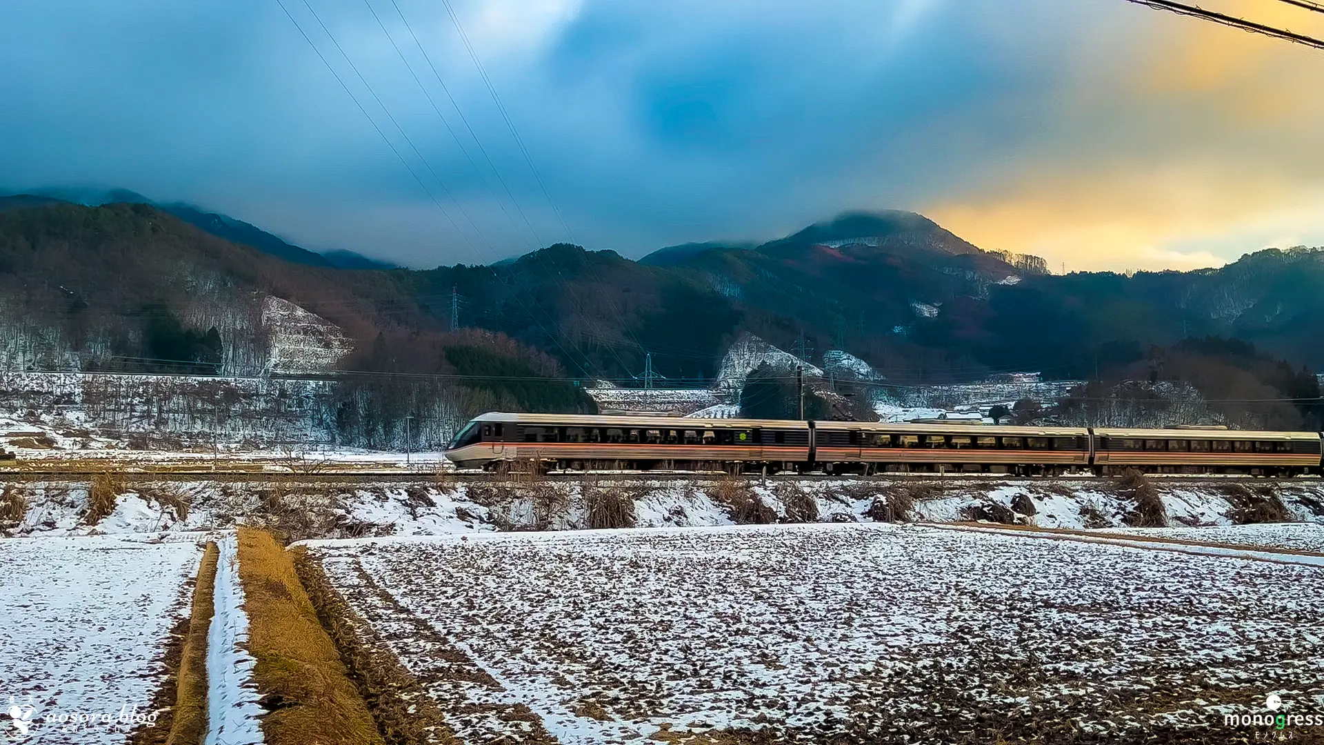 筑北村で見る篠ノ井線と雪化粧